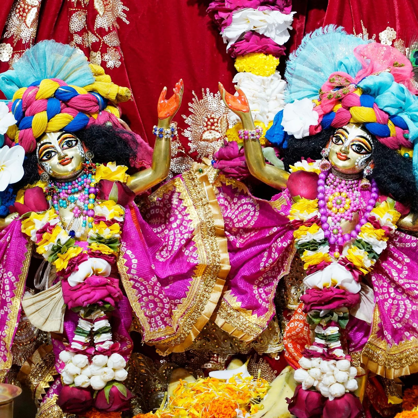 Idols of Lord Krishna and Radha in a temple