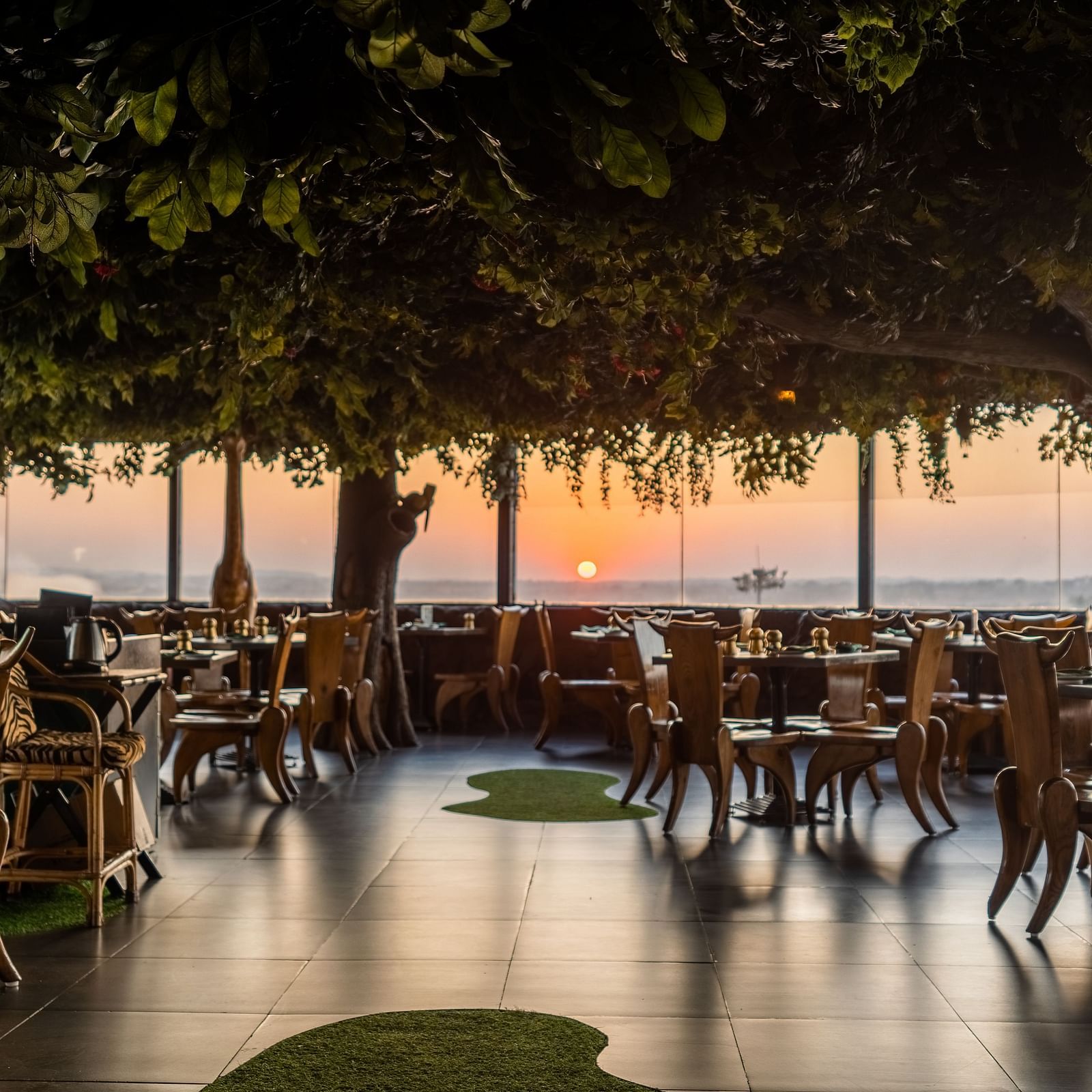 An image of a forest themed Jungle Restaurant at The President Hotel, Hubli