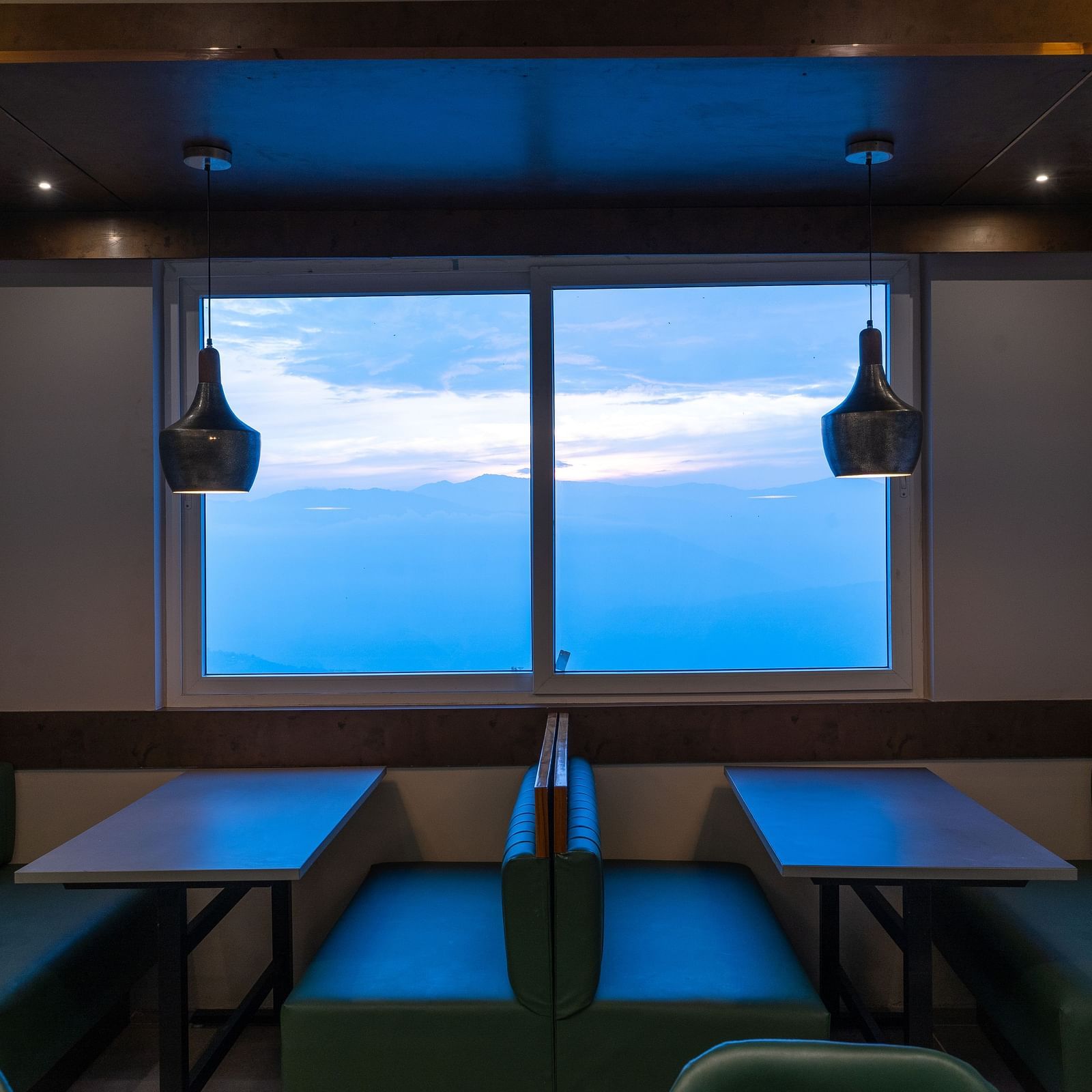 image of the restaurant with amazing mountain view at The Soma by Avianna Group, Darjeeling