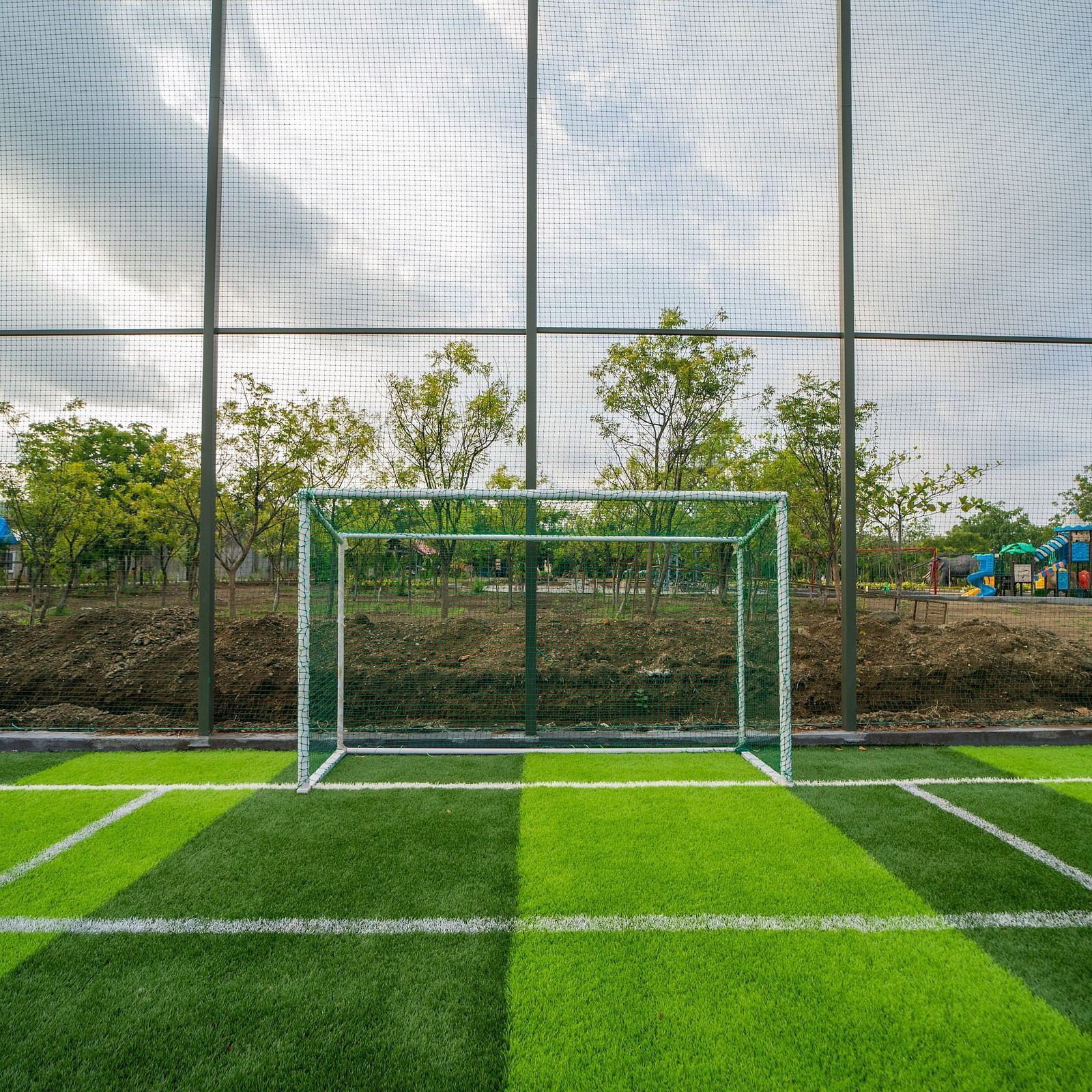 An image of a football turf with a goal post - Trance Veechika Resort, Vikarabad