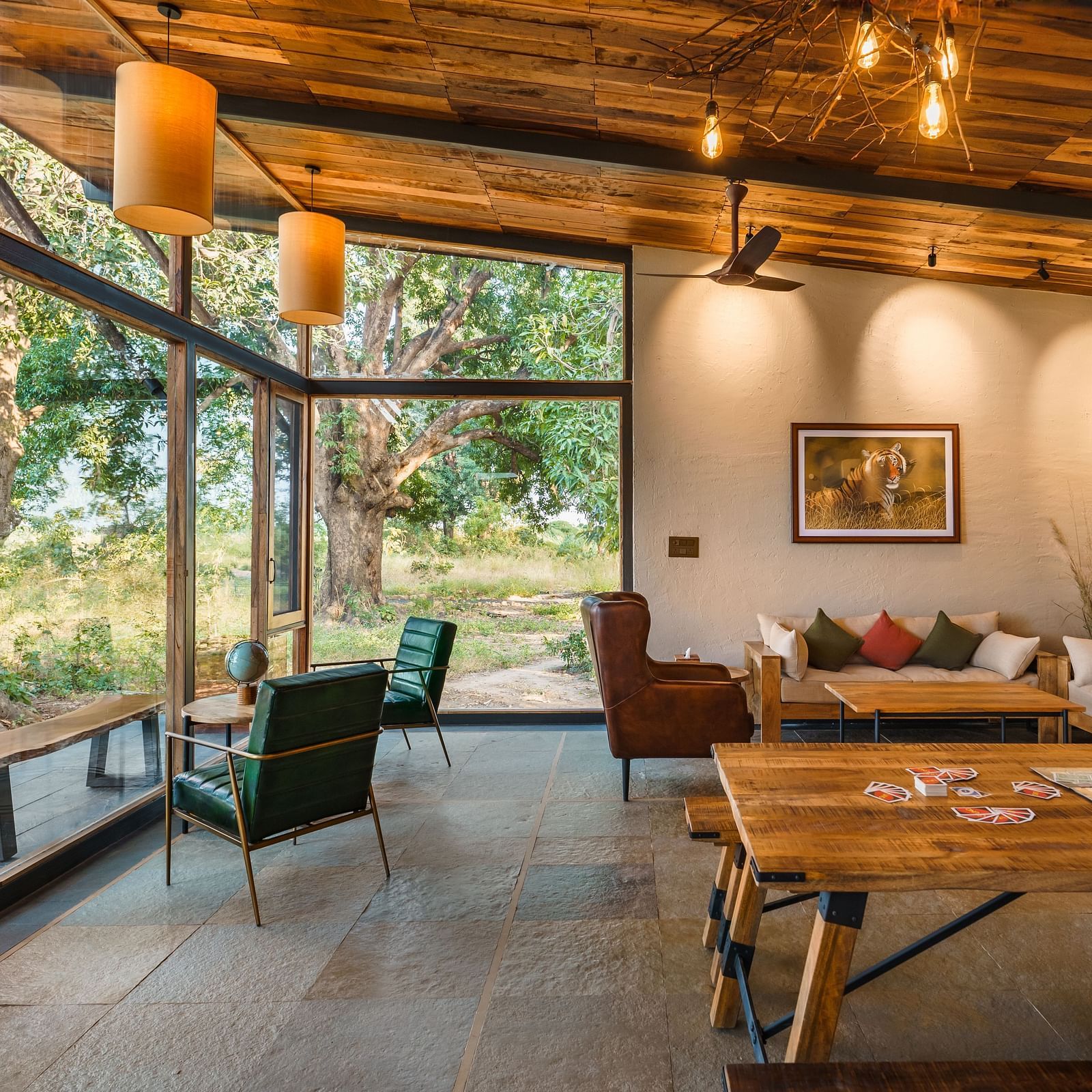 Cosy sofas at lounge at Trees N Tigers, Tadoba.