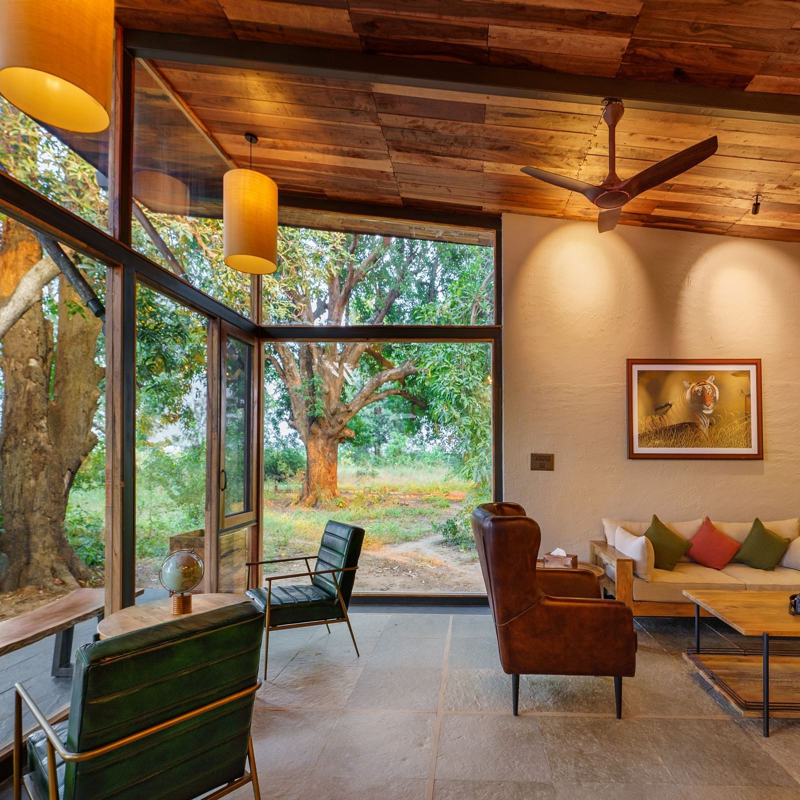 Cosy sofas at lounge at Trees N Tigers, Tadoba.