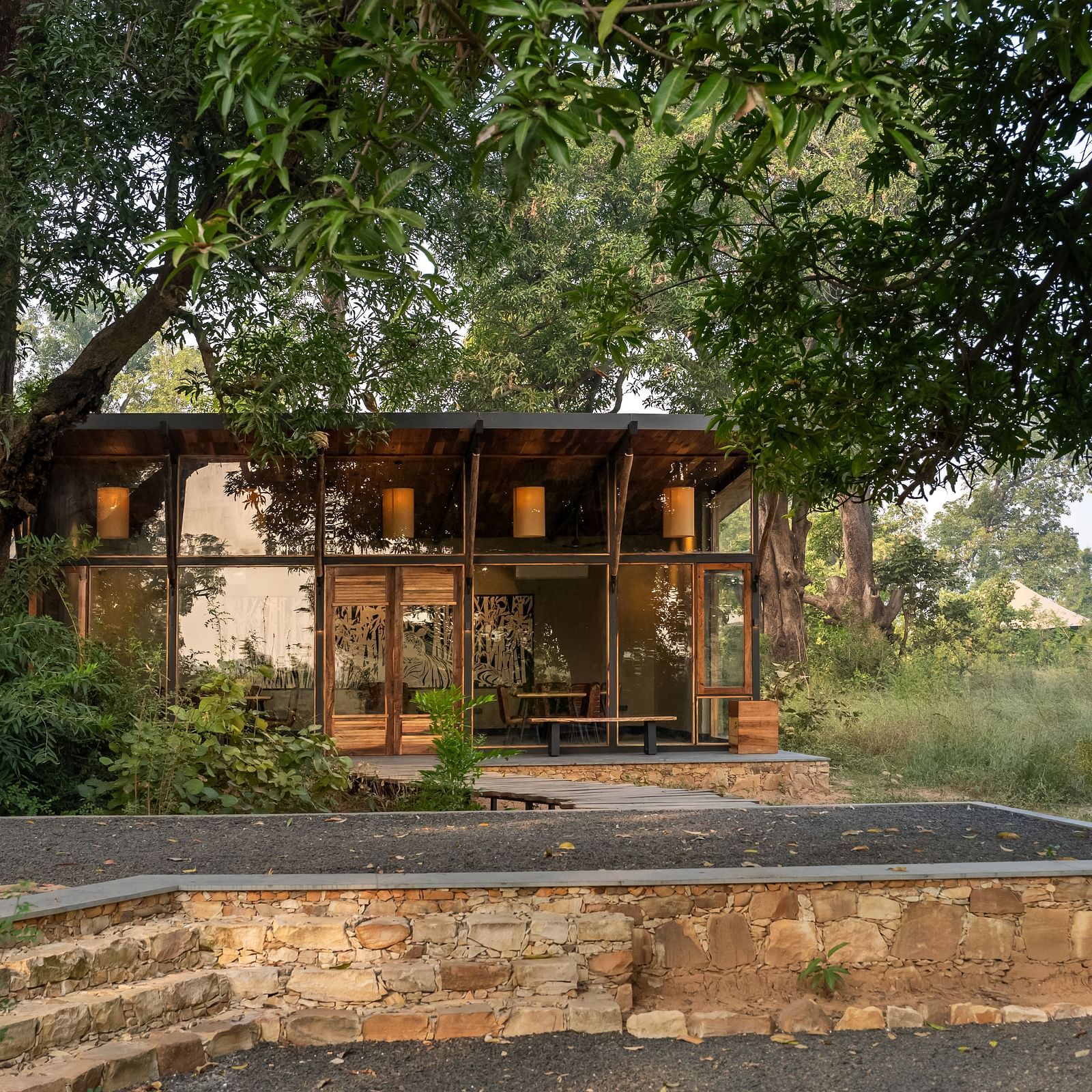 View of a hut amongst greenery at Trees N Tigers, Tadoba.