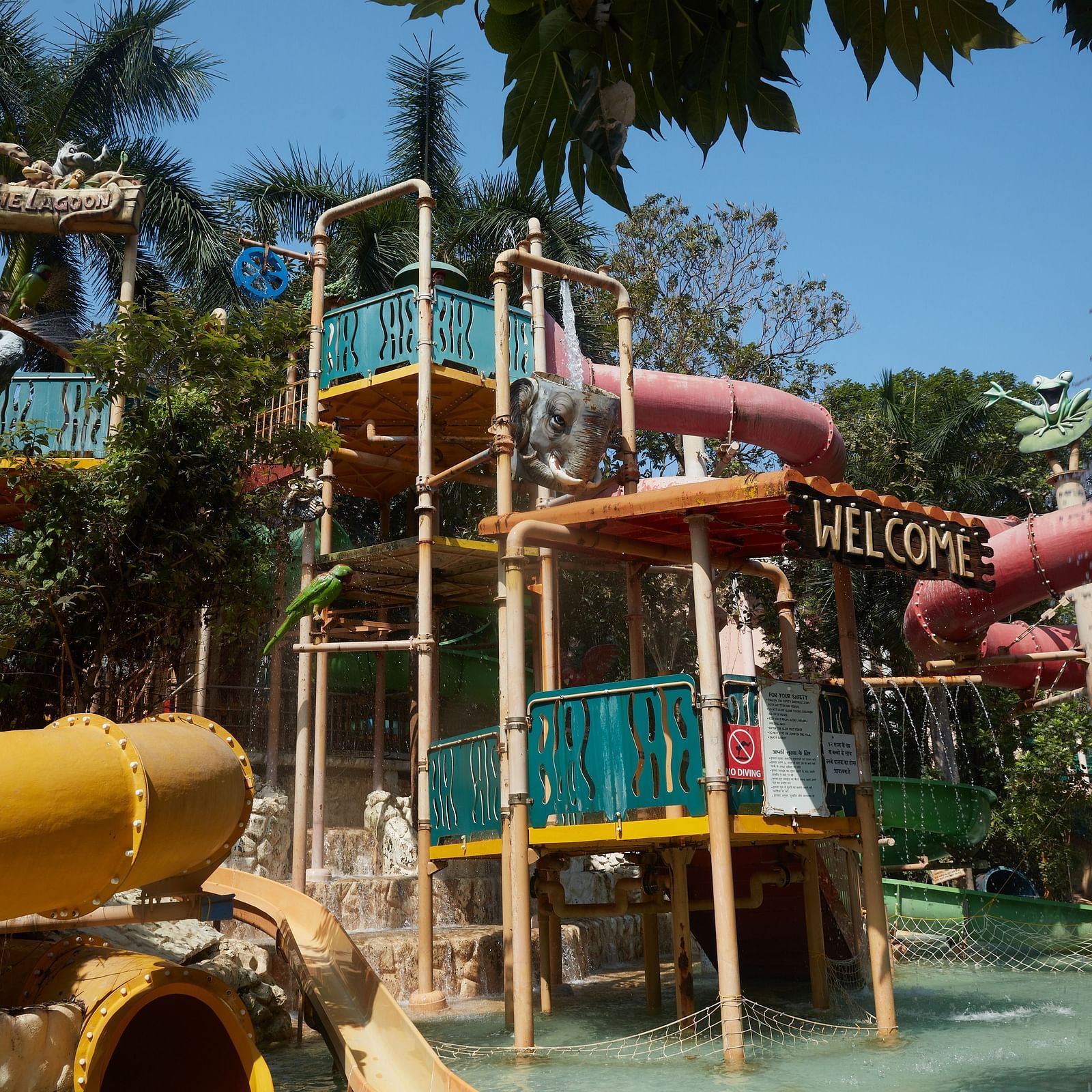 Image of Waterfall at Water Kingdom under clear blue sky