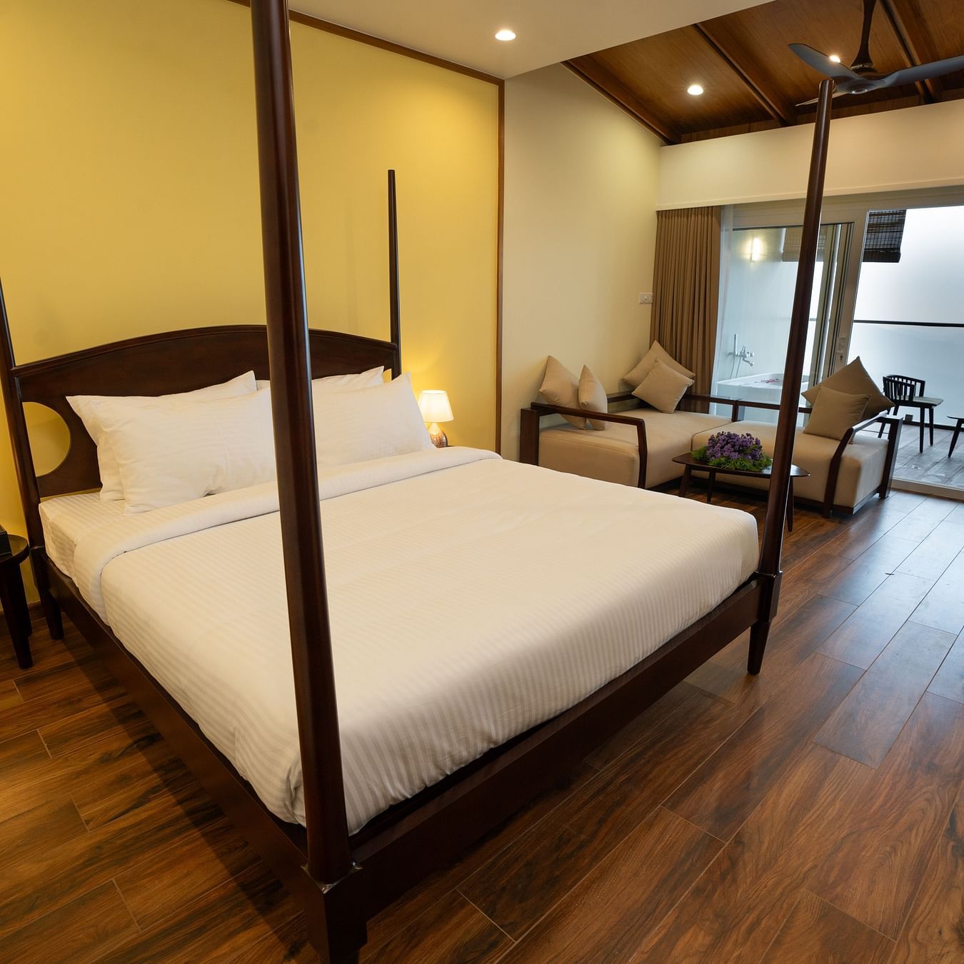 A bed in a room with a mountain view | Misty Queen by Dimora, Kakkadampoyil