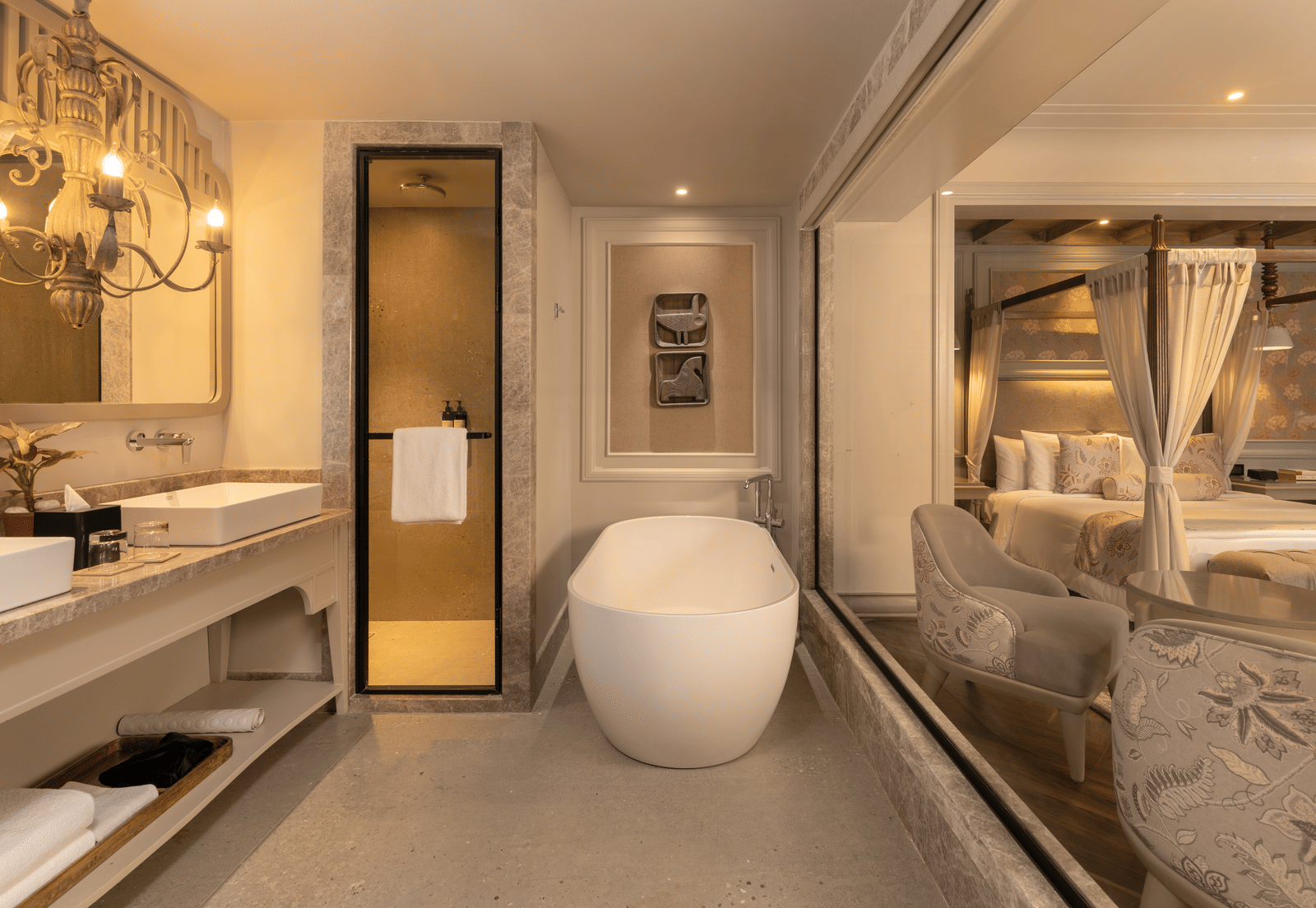 The bathroom featuring a free-standing bathtub along with a shower cubical beside it at the Evren Suite at The Evren, Vagator.