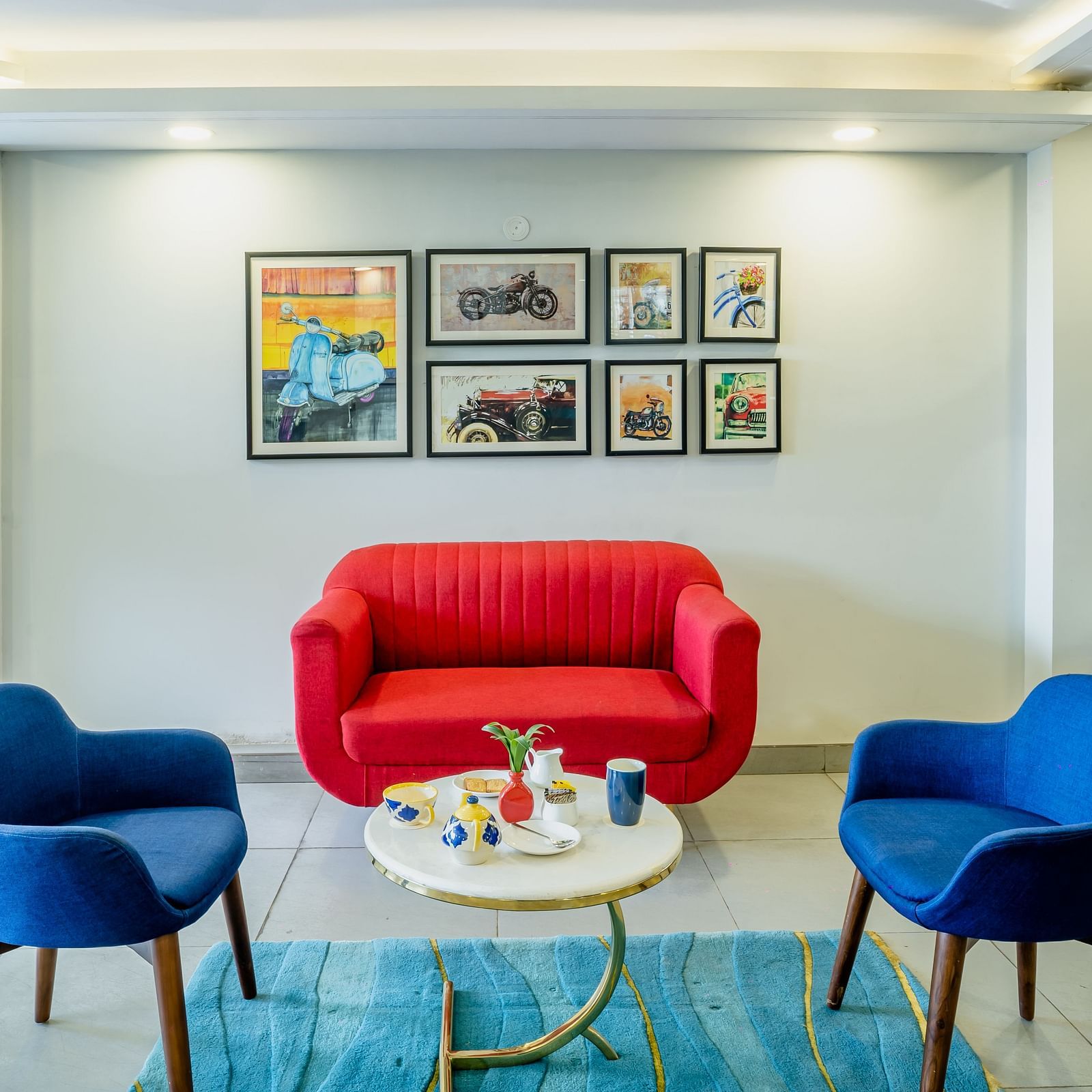 An image of a sitting area in a lobby | Inde Hotel Golf Course Extension