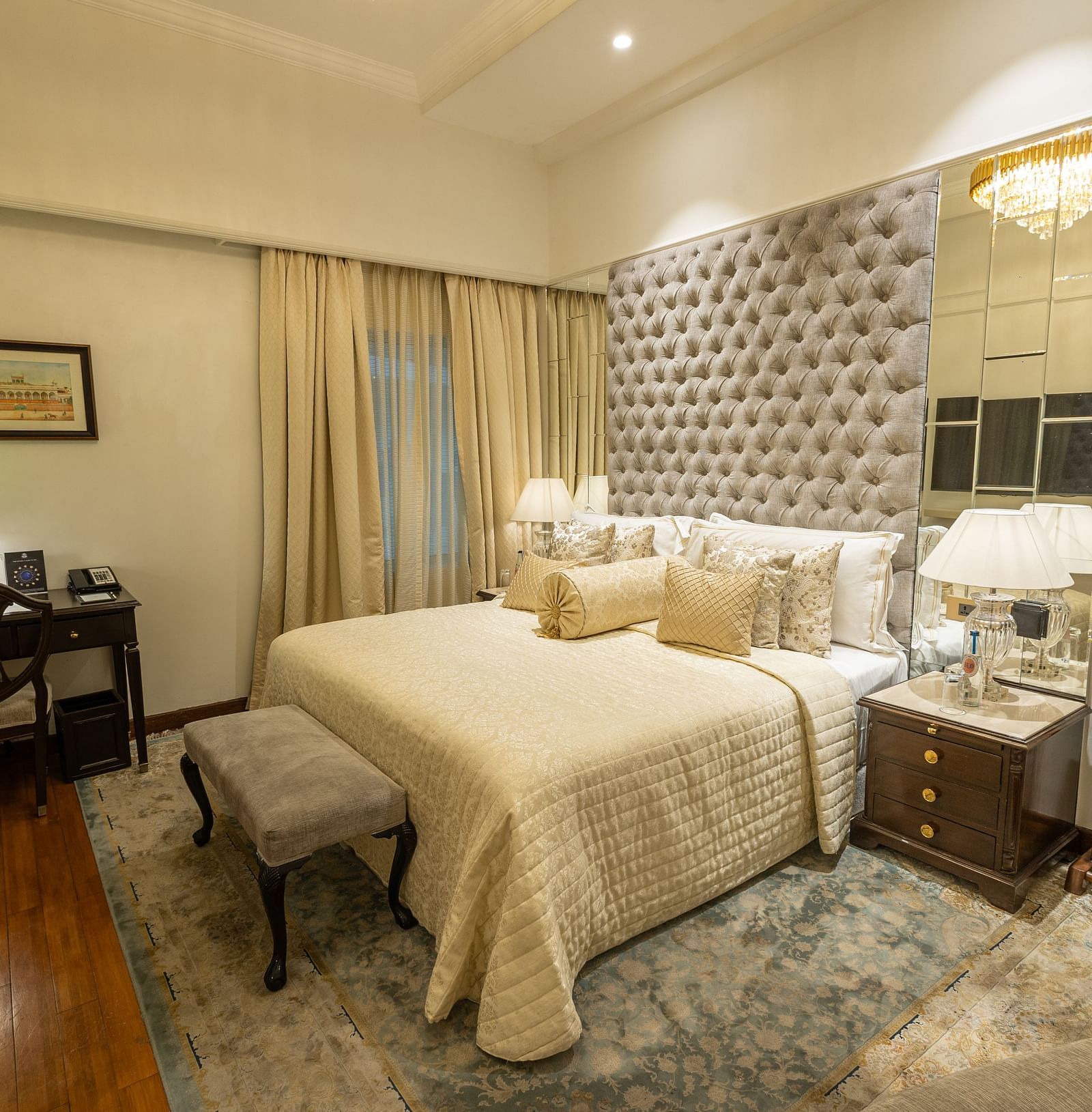 Superior King Bed Room at The Claridges New Delhi, featuring a cosy king sized bed with plush pillows and bedside lamps