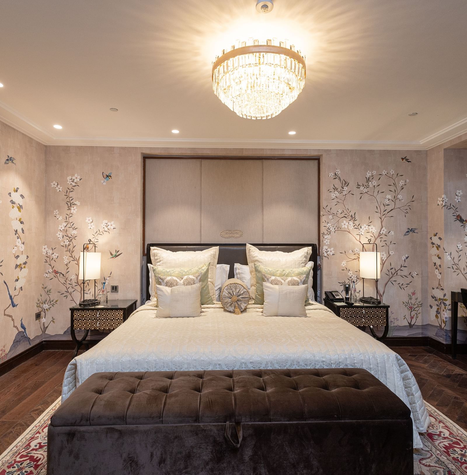 image of a bedroom with classy and elegant interiors featuring a king size bed at the cabana room - The Claridges New Delhi