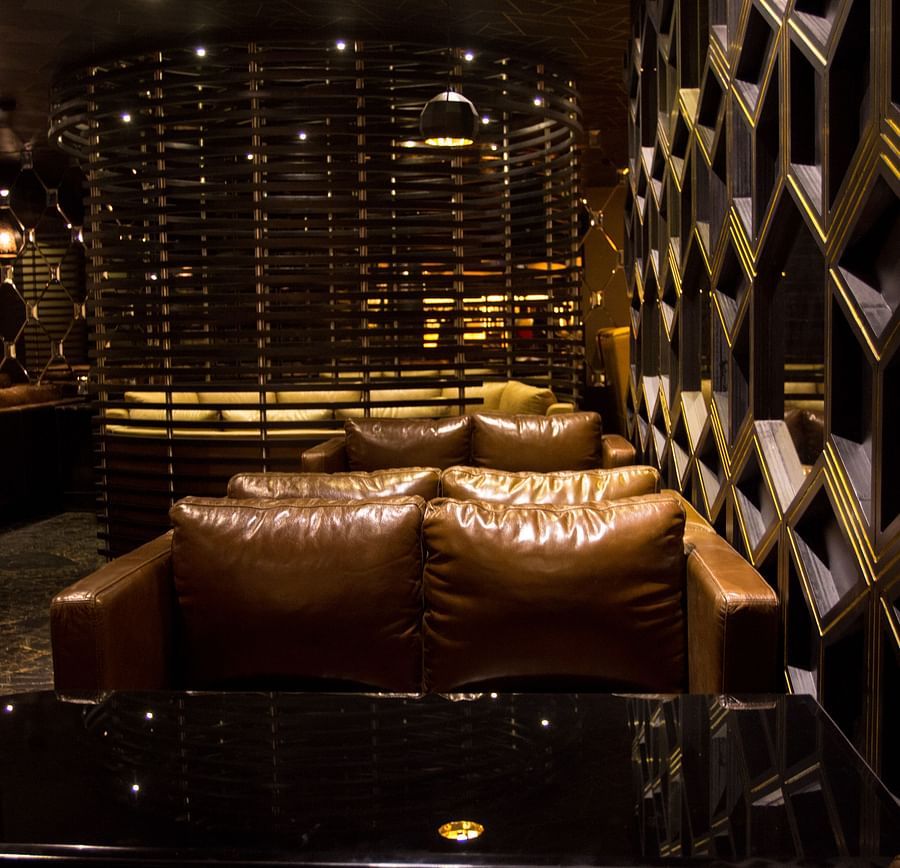sofas inside the Lounge at Alchemy, our in-house bar in Chennai - Raj Park Hotel, Chennai
