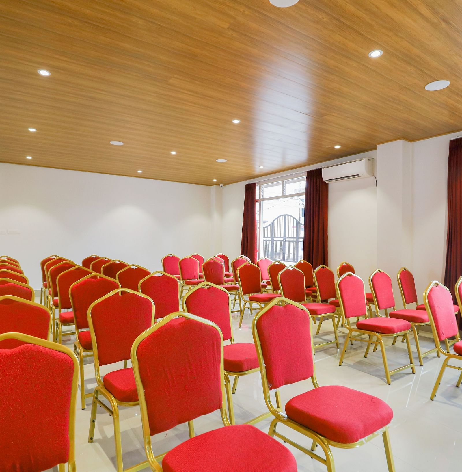 event setting with red chairs at Banari Regency by Summit, Namchi