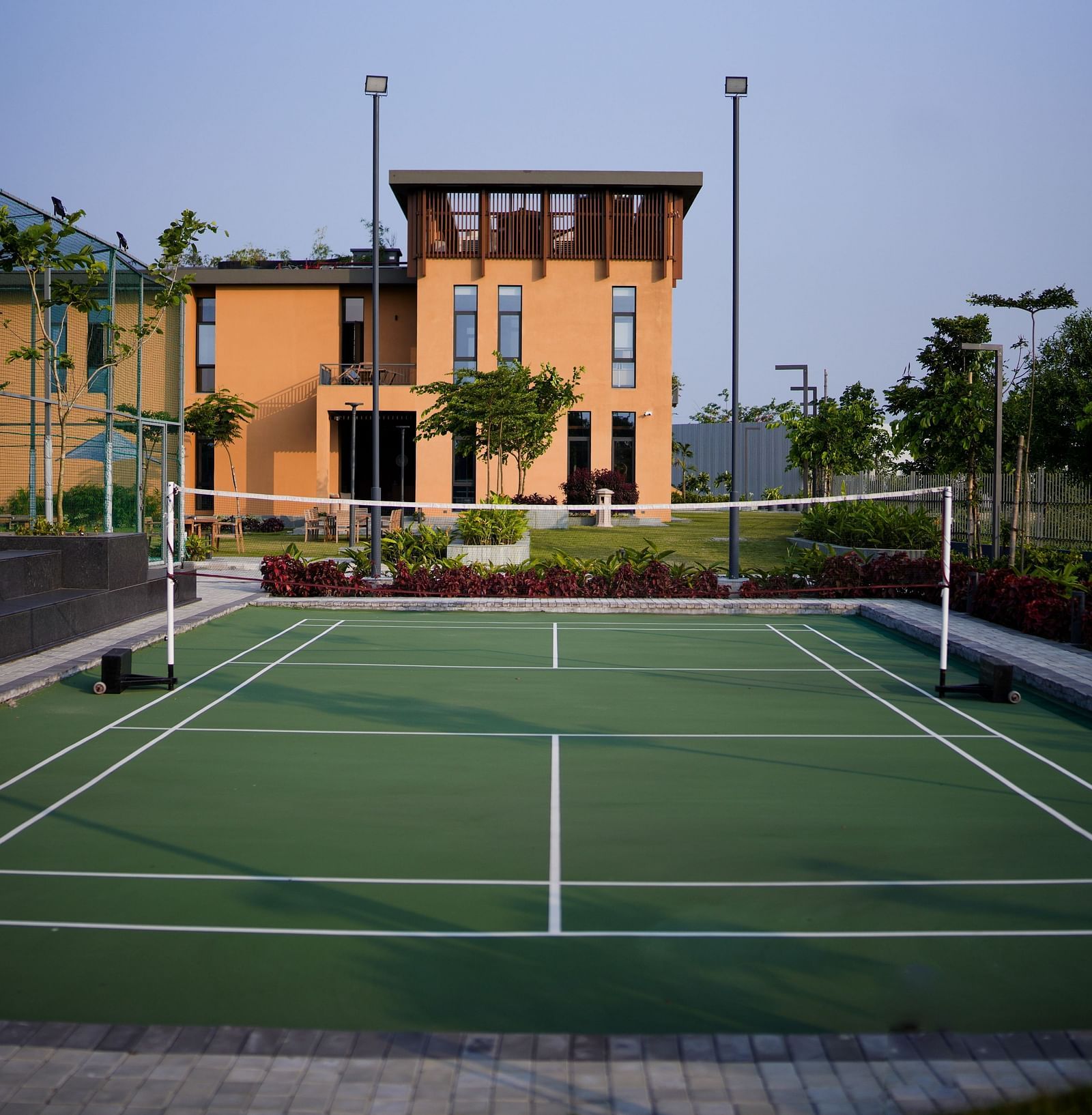 Badminton court at Singalila Club during the day