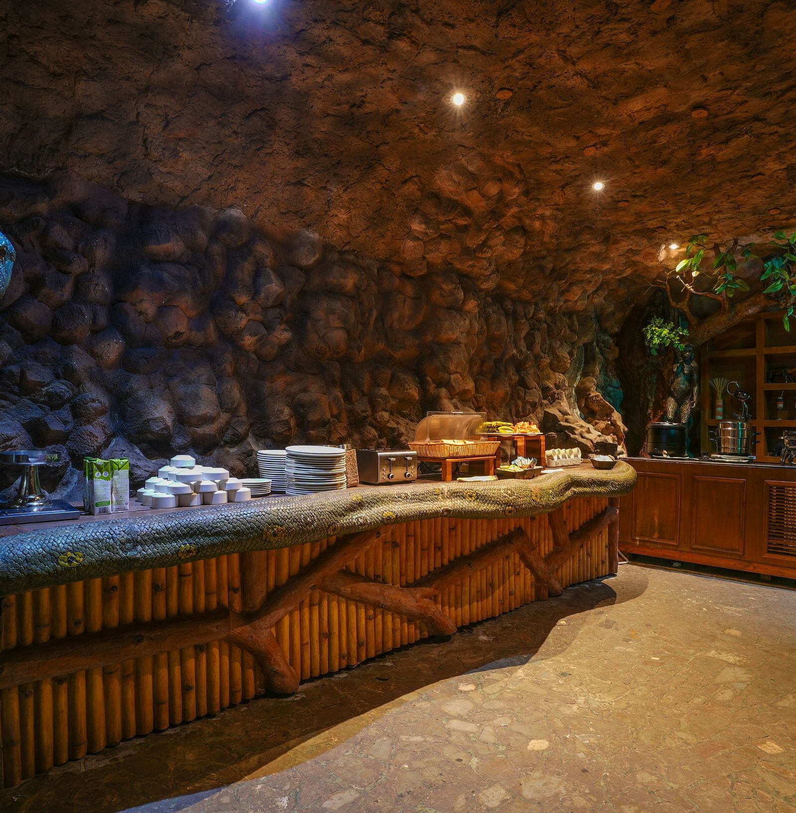Kholong restaurant with a rock-themed décor, warm lighting, all tables, seating, and culinary arrangements arranged aesthetically5