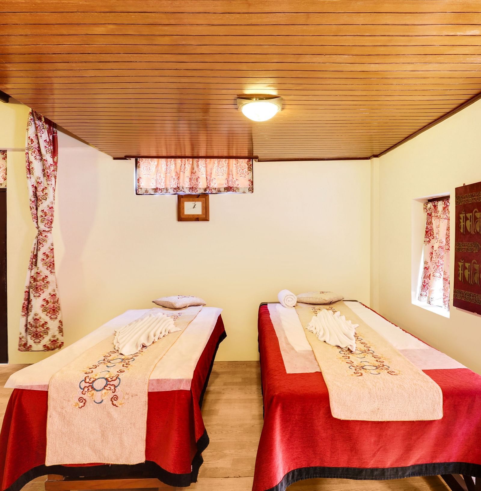 The spa area is meticulously arranged with cushions, plush sheets and neatly folded towels at Summit Norling Resort & Spa, Gangtok.