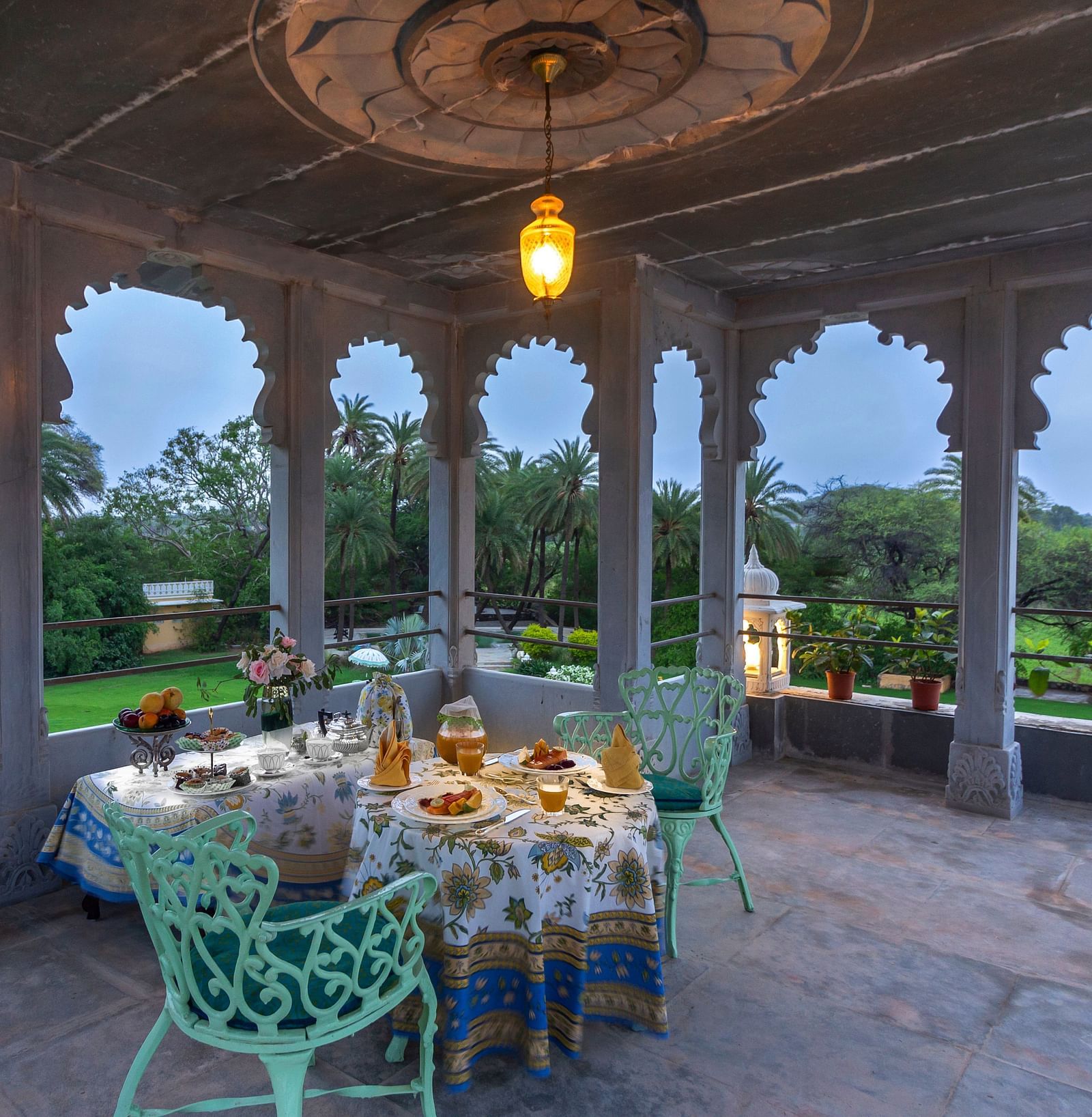 image of an intimate dining arrangement at Dev Shree, Deogarh overlooking beautiful views