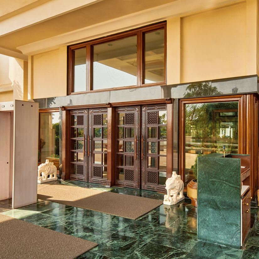 The Ummed Ahmedabad hotel exterior view with landscaped surroundings