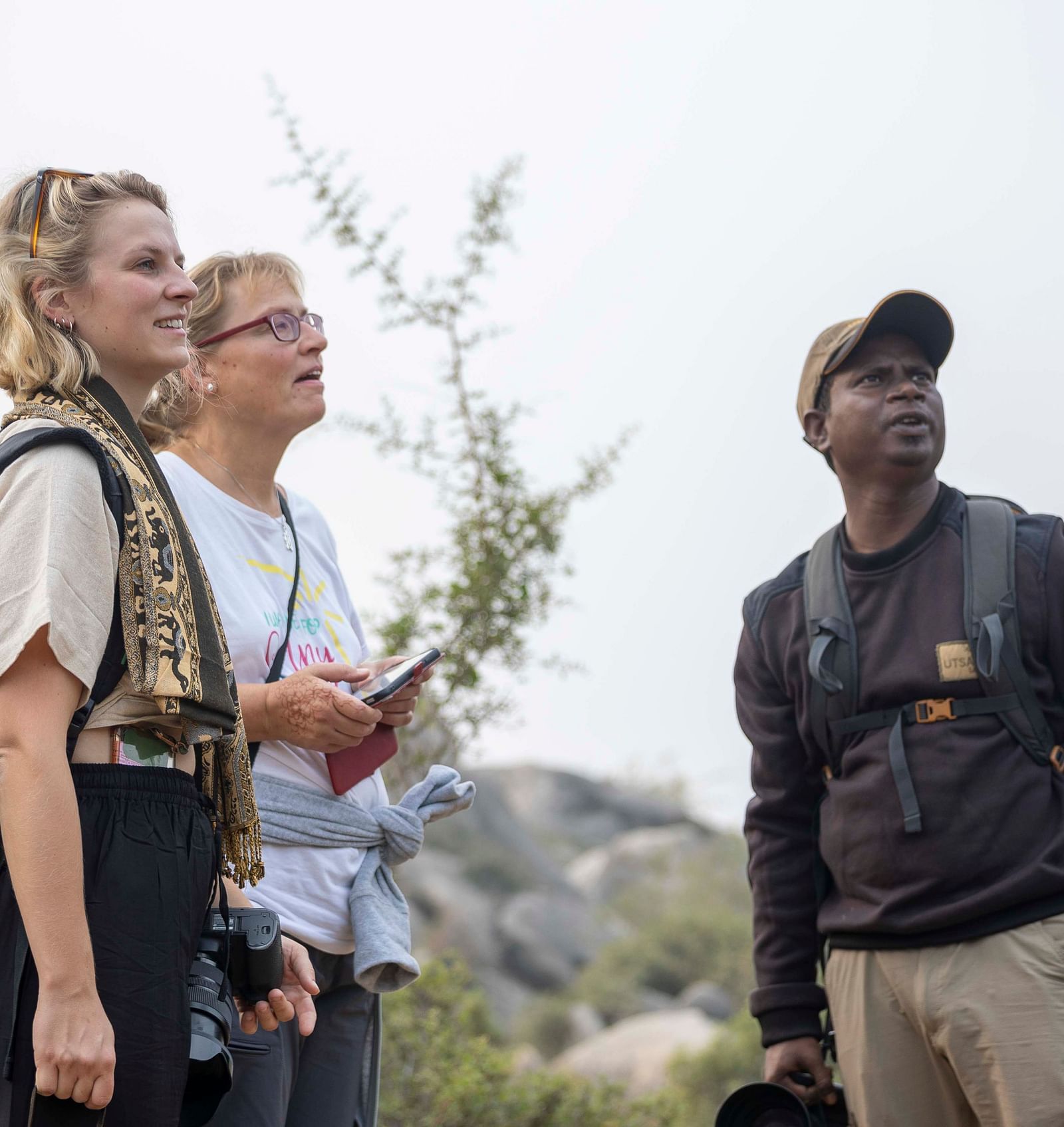 An image of two women with a tourist guide - Utsav Camp Sariska