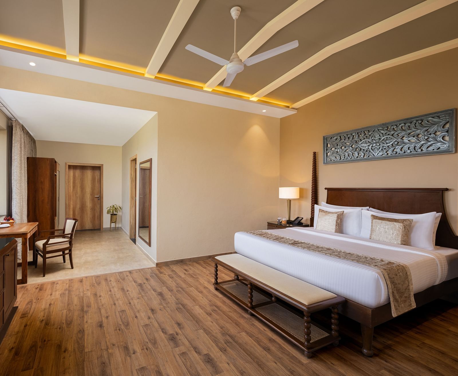 Executive Suite Room with double beds placed in front of TV at Essentia Luxury Resort & Spa, Udaipur.