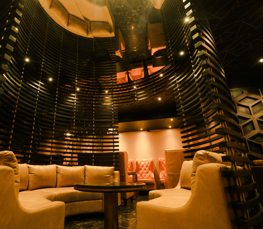 An overview of the seating arrangements inside the Lounge at Alchemy, our in-house bar in Chennai - Raj Park Hotel, Chennai.