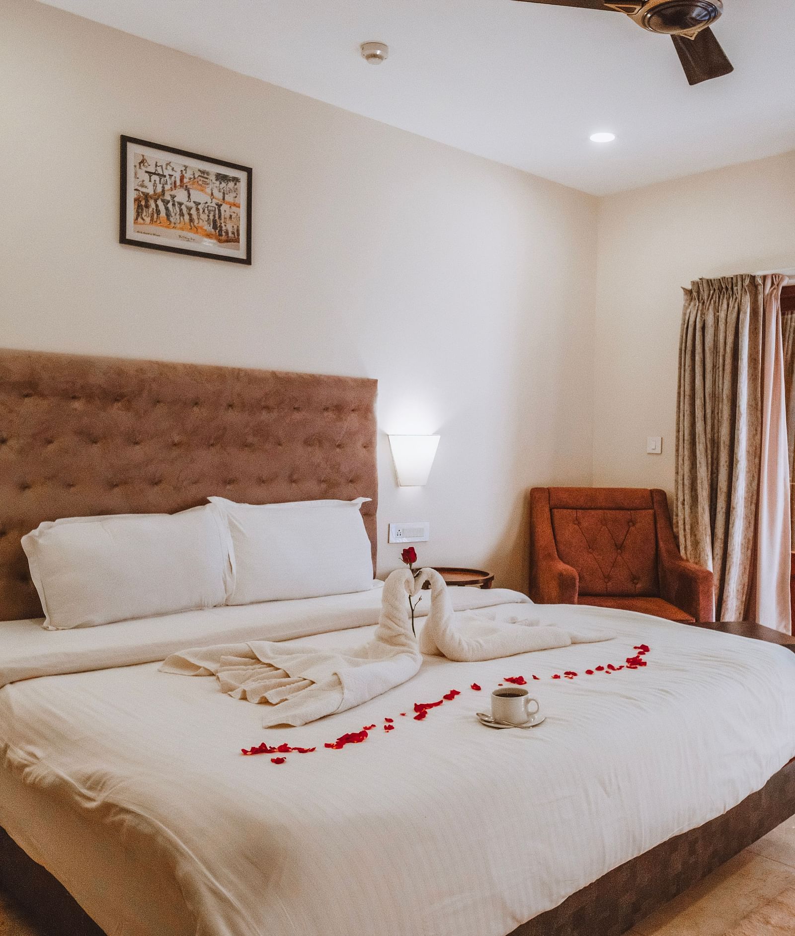 Spacious bedroom with a bed and balcony access at The Verda de Miranda Resort.