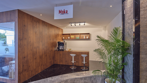 bar stools and a coffee machine at moka, our bakery in mahabalipuram - Grand Continent, Mahabalipuram