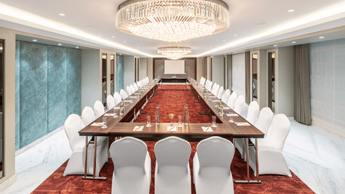 An image of U-shaped seating arrangement our Sampark banquet hall in Haridwar - MJ Sarovar Portico, Haridwar