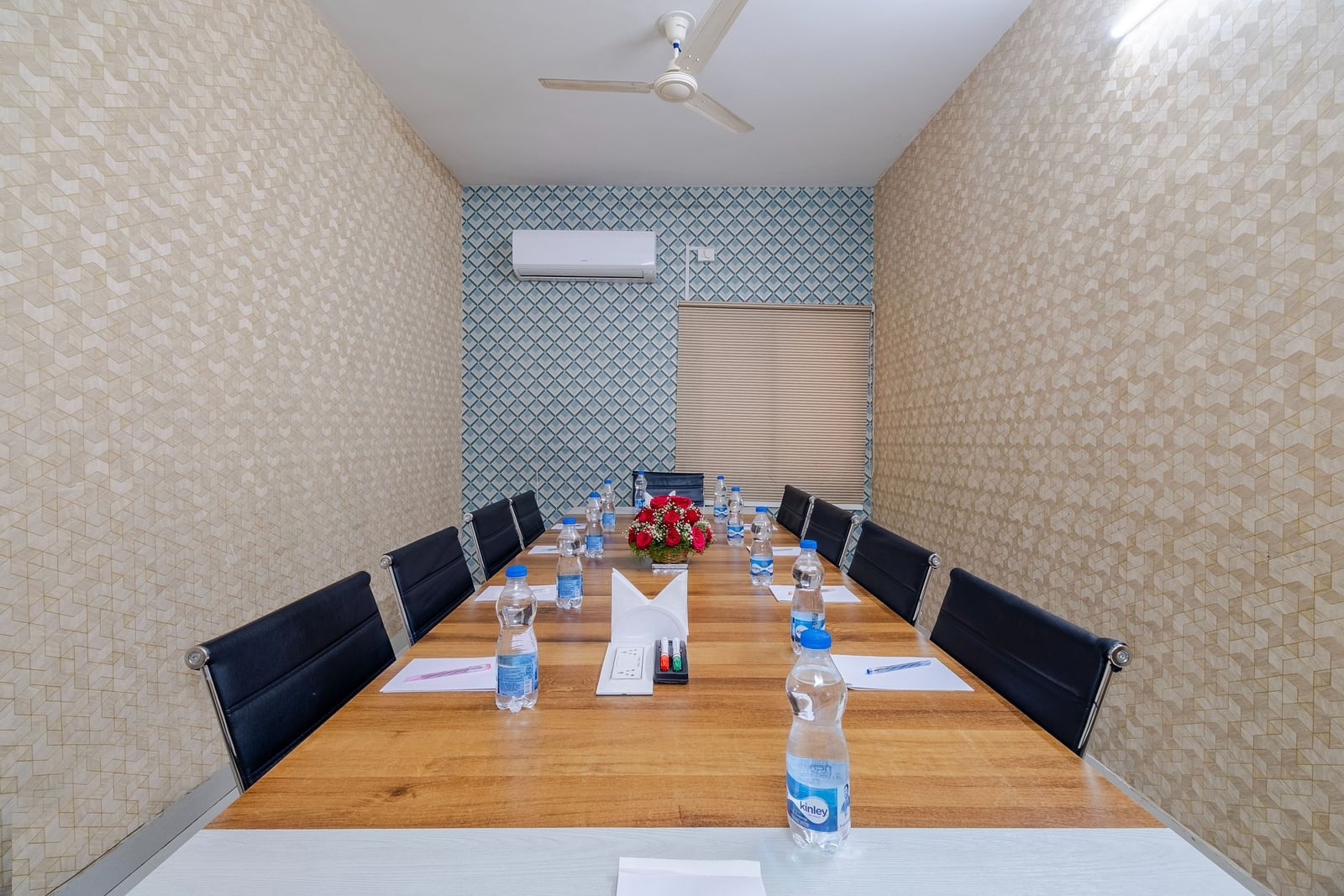 Boardroom setup with table and seating at Lemonridge Hotels