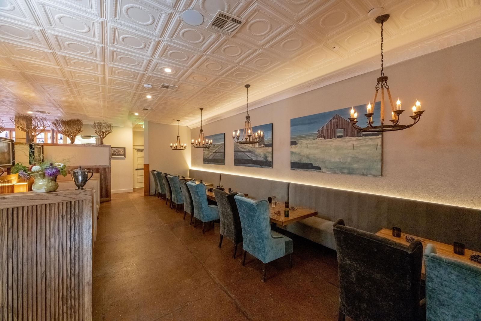Interior of a restaurant area with cozy seating at The Grand Hotel & Ballroom, McKinney.