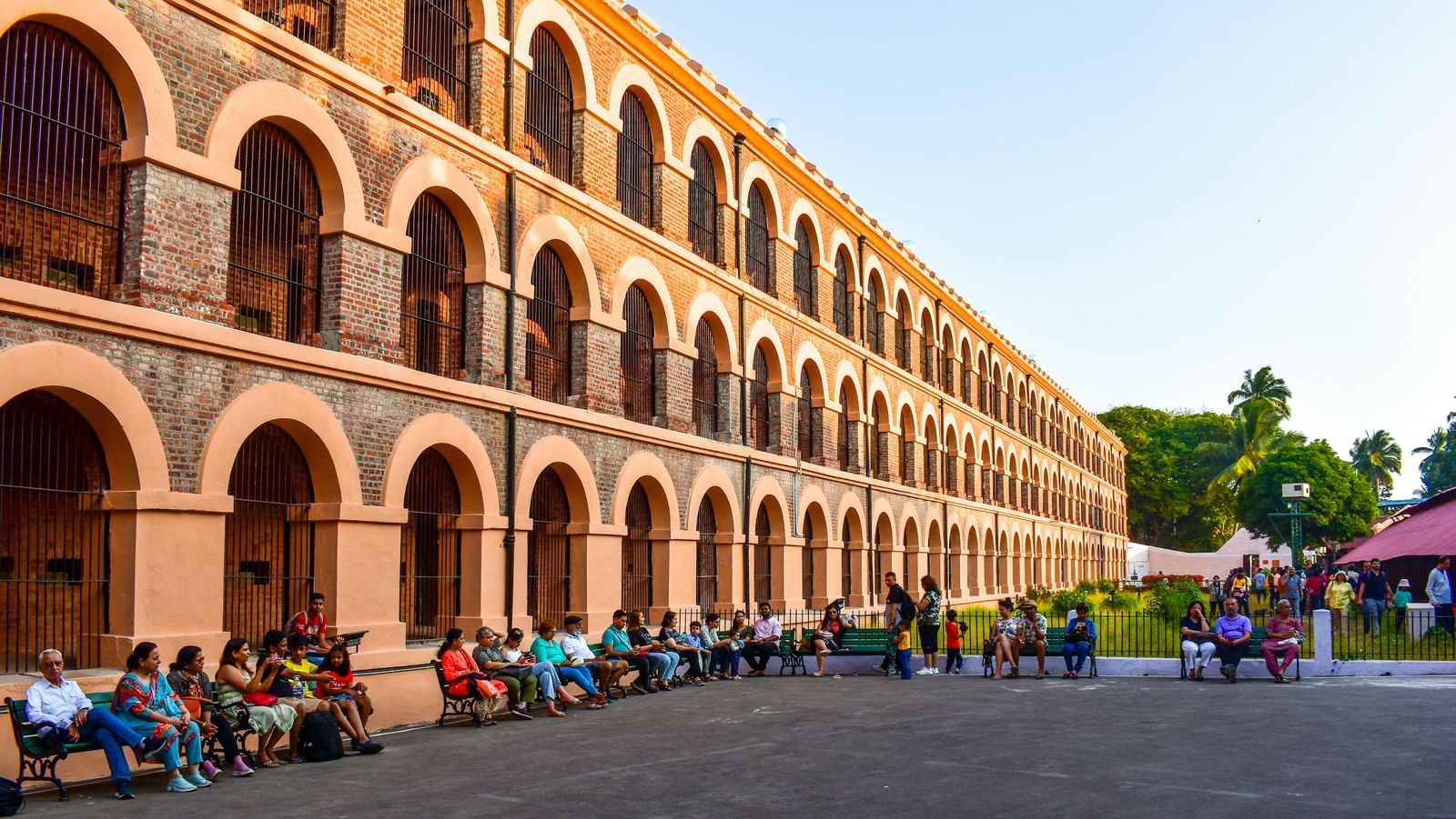 Corner view of the exterior of the Cellular Jail, Port Blair with the sun rays illuminating the facade.