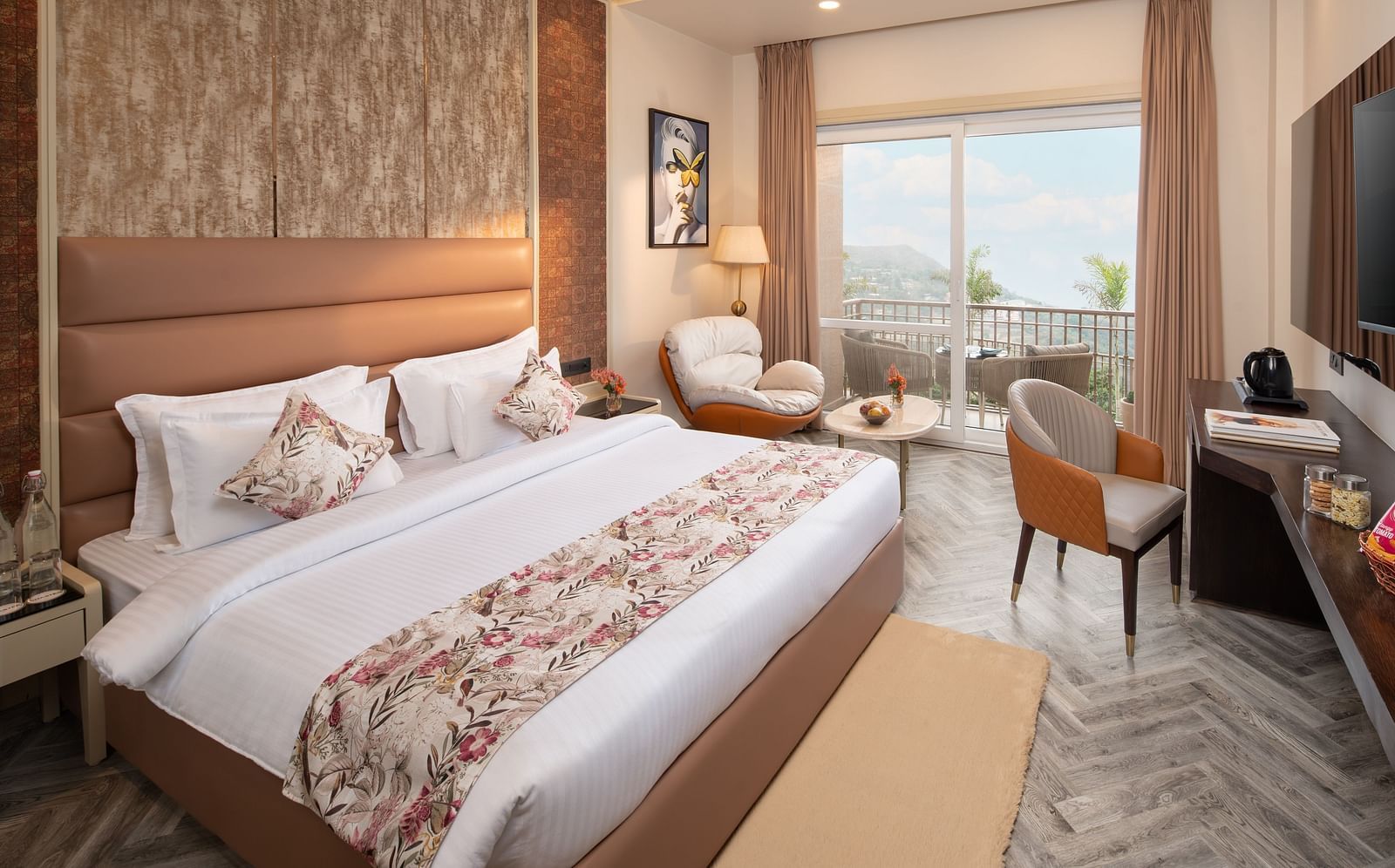 Superior room at Leisure hotel with double bed and sofa and TV at Mountoria Retreat, Naukuchiatal