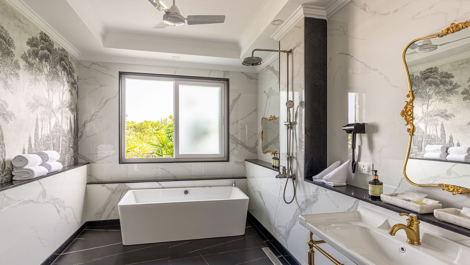 Contemporary bathroom with dual sinks and large mirror at MAYFAIR Palm Beach Resort, Gopalpur-on-Sea
