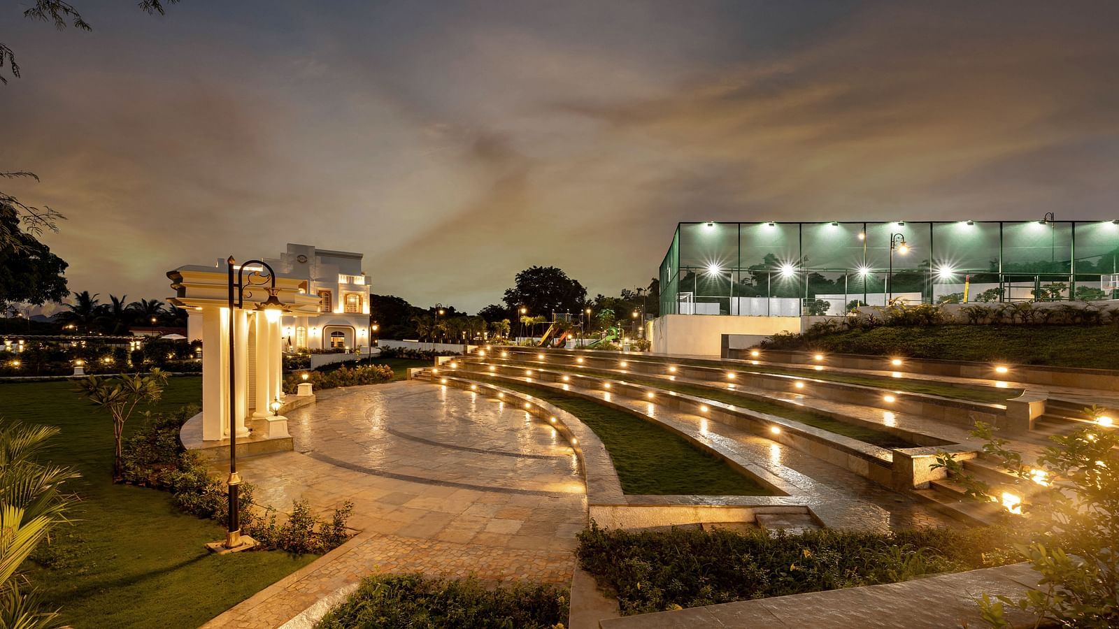 The Amphitheatre at Imperial Goa taken during the night with the bright exterior lights illuminating the area.
