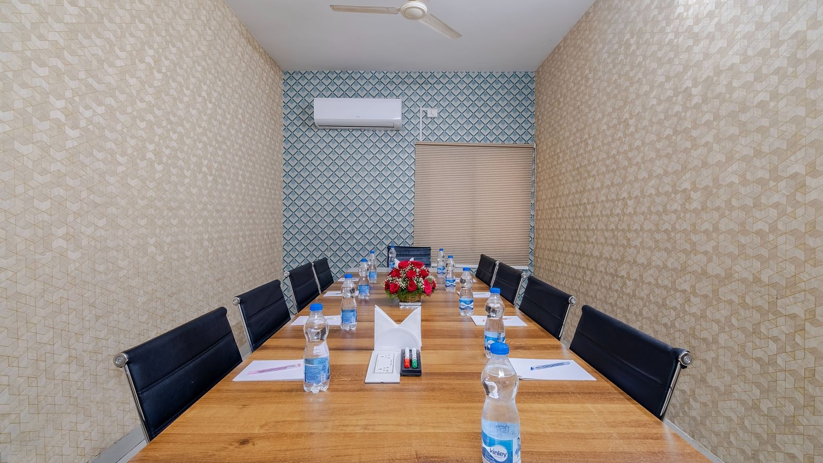 Boardroom setup with table and seating at Lemonridge Hotels