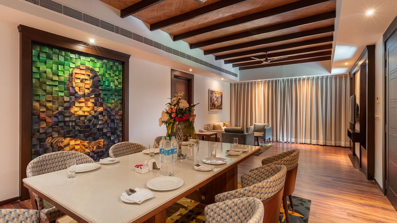 Dining area with a dining table and chairs inside Ananta Villa - The Ananta Udaipur