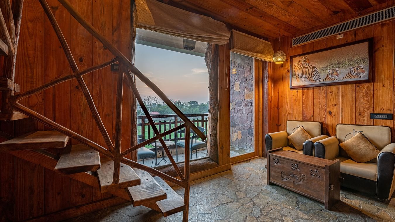 one of the duplex cottages in Ranthambore with a sofa set at one corner 1