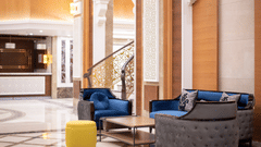 Close up view of the seating arrangements inside the lobby - La Maison Hotel, Doha