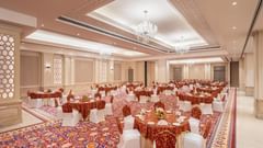 tables and chairs set up in a cluster arrangement in our banquet hall in jalandhar - Park Plaza, Jalandhar