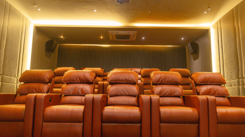 A theatre setup with recliner sofas at Montclair Ananta, Elite.