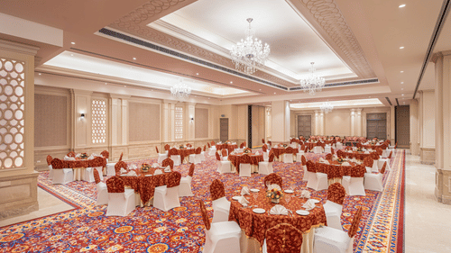 tables and chairs set up in a cluster arrangement in our banquet hall in jalandhar - Park Plaza, Jalandhar