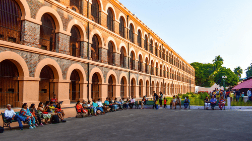 The facade of Cellular Jail in Port Blair with visitors awaiting the light and sound show that happens in the evenings.