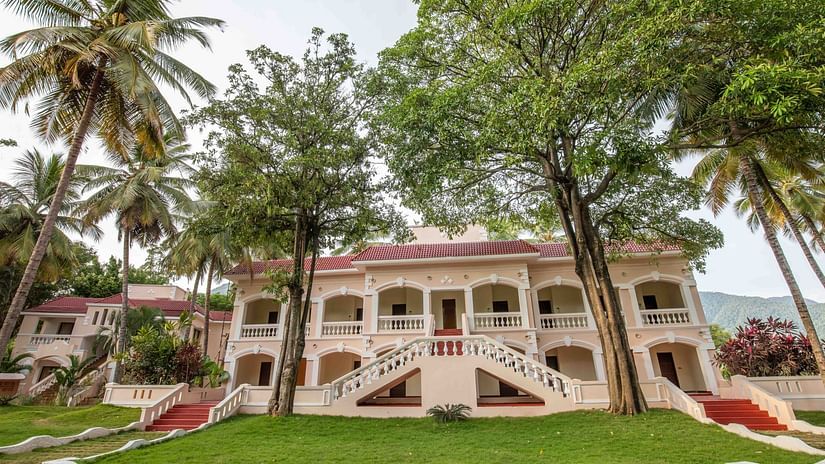facade image of Avana resort surrounded by the trees - Black Thunder, Coimbatore.
