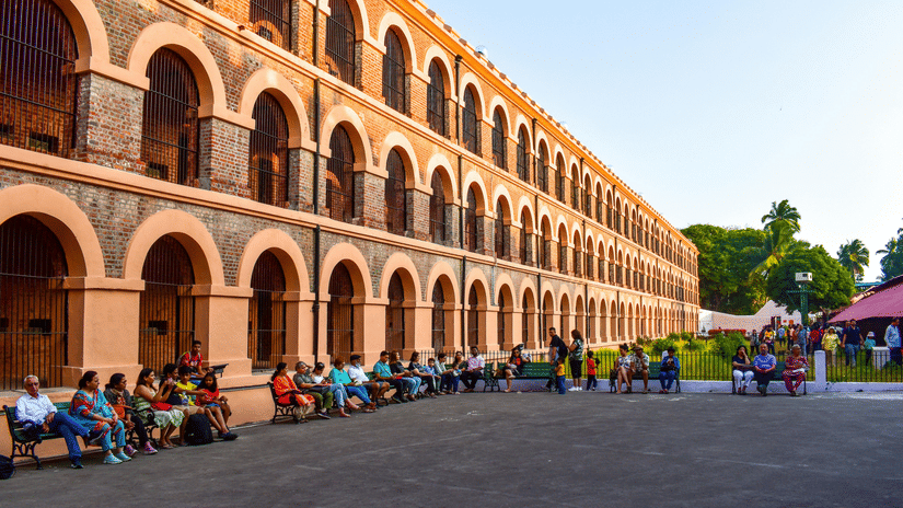 The facade of Cellular Jail in Port Blair with visitors awaiting the light and sound show that happens in the evenings.