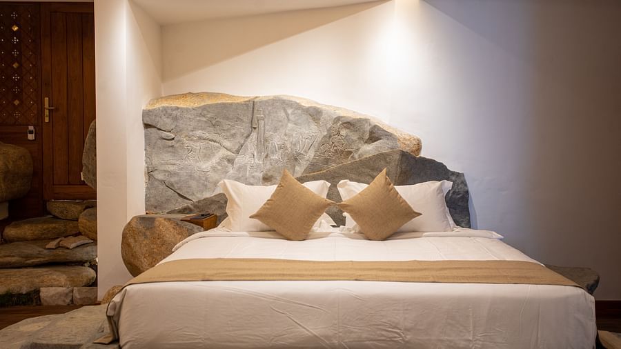 close up image of a the plush king size bed at the rock suite at the beacon by the bay villas and suites in dondra