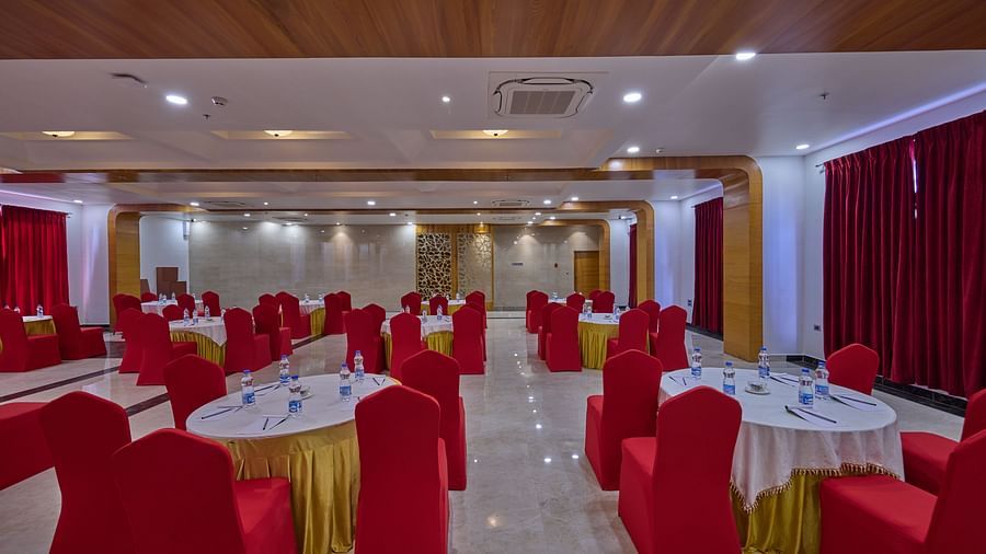 the indoor seating space of the banquet hall - Golden Tulip, Tirupati  3
