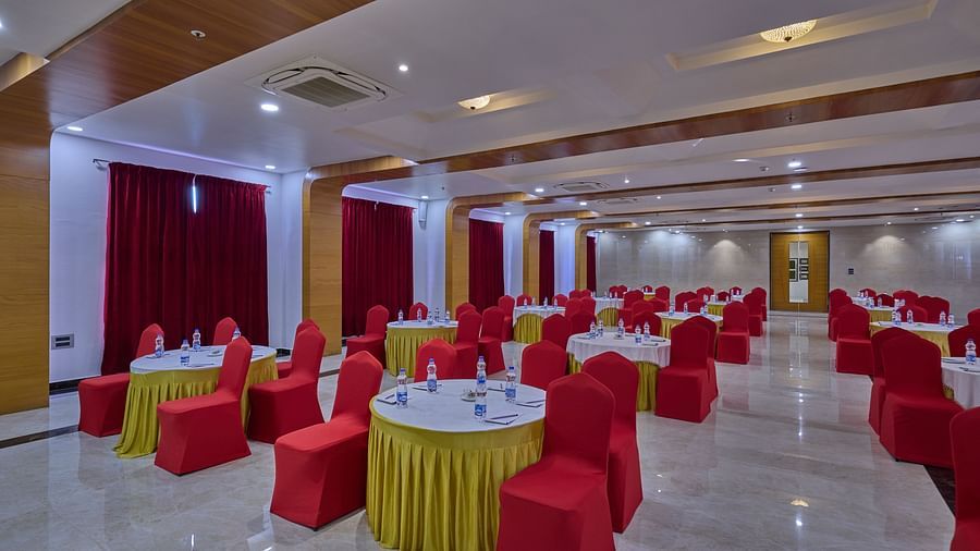 the indoor seating space of the banquet hall - Golden Tulip, Tirupati  00