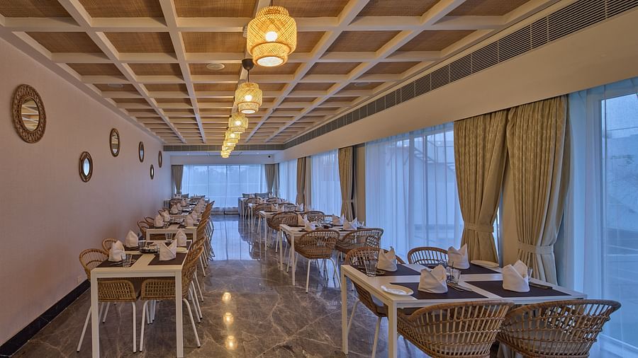tables and chairs in our restaurant - Grand Continent, Mahabalipuram