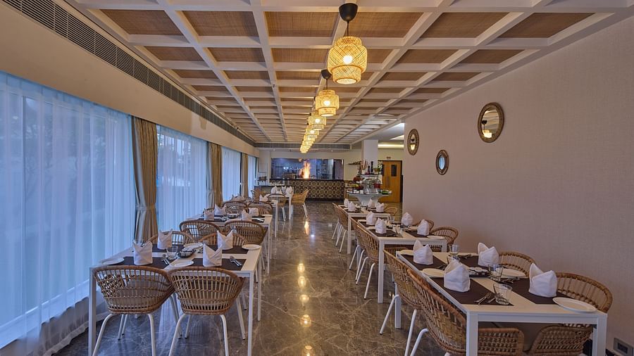 tables and chairs in our restaurant in Mahabalipuram - Grand Continent, Mahabalipuram
