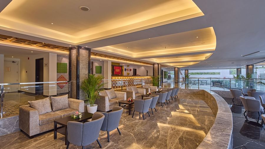sofas and armchairs in the lobby of our hotel in mahabalipuram - Grand Continent, Mahabalipuram