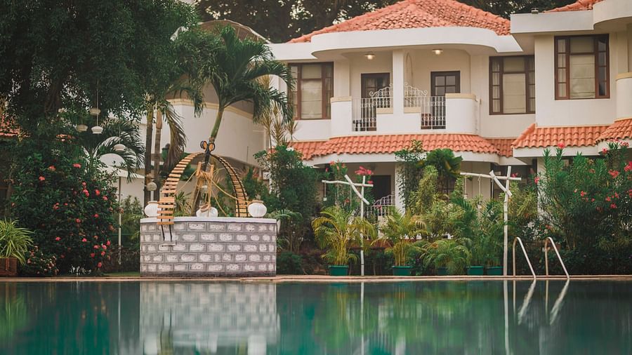 exterior of a beautiful resort with swimming pool in goa