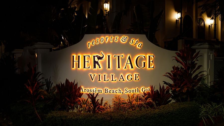 heritage village resort and spa in goa signboard